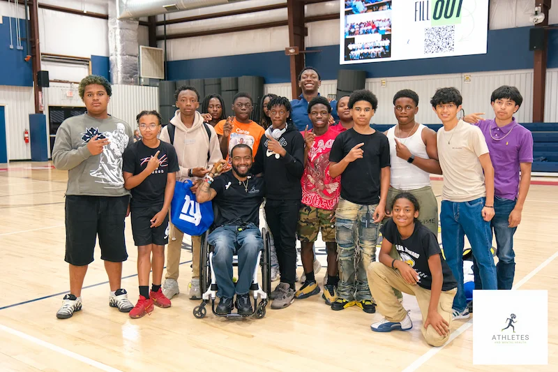 Dr. Lovie with athletes